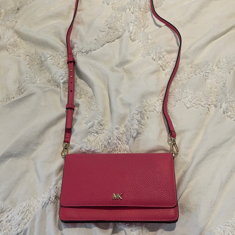 Brand new pink Michael Kors Wallet on a Chain.